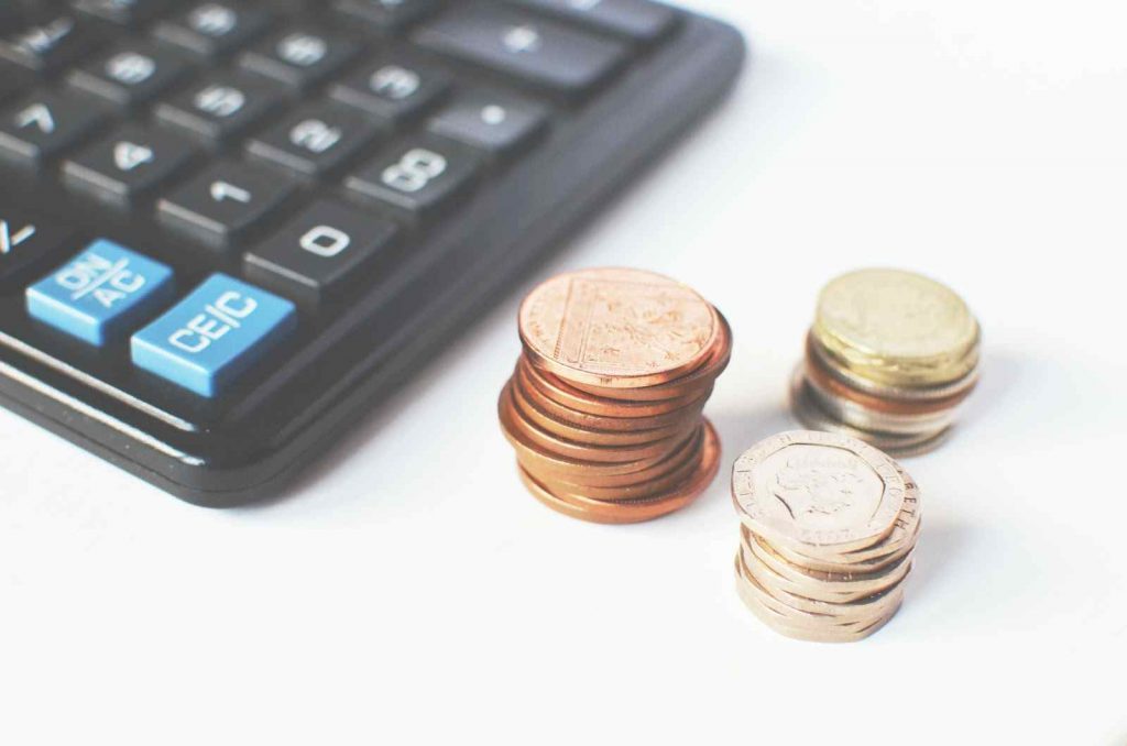 a calculator and small coins