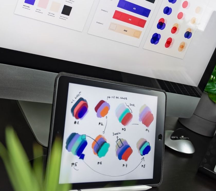 A desktop screen and tablet showing a design system