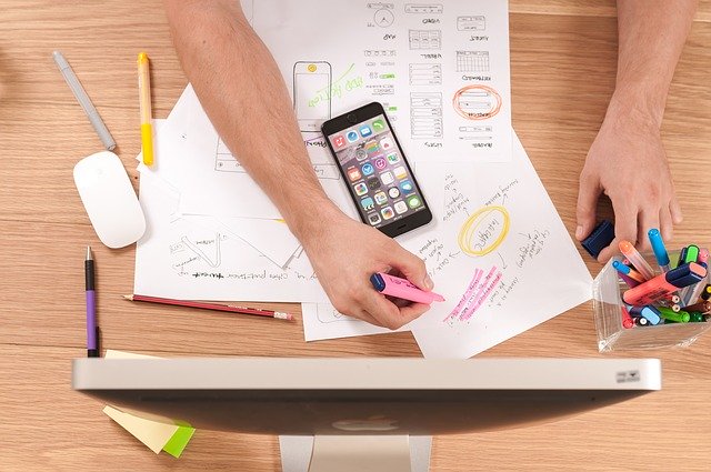 a person sketching a clean wireframe