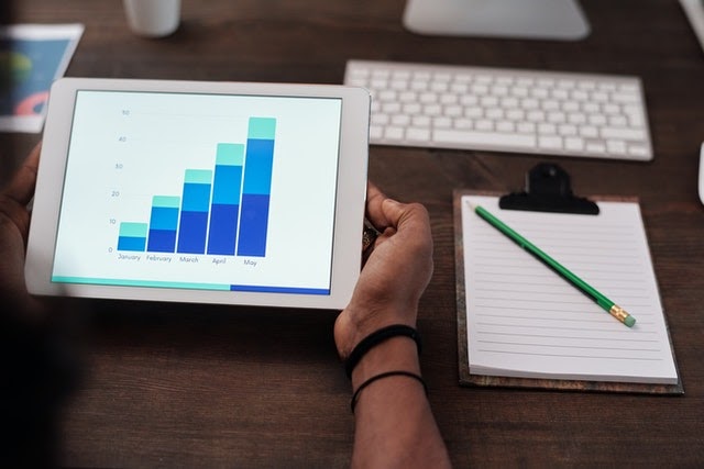 a person looking at a chart