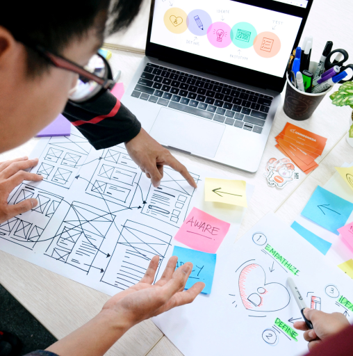 Group of people discussing wireframes